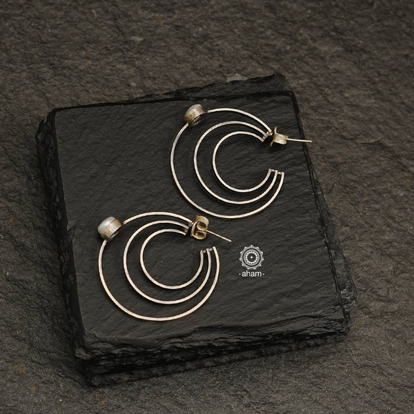 Handcrafted floral hoops. Contemporary light weight earrings in 92.5 silver. 