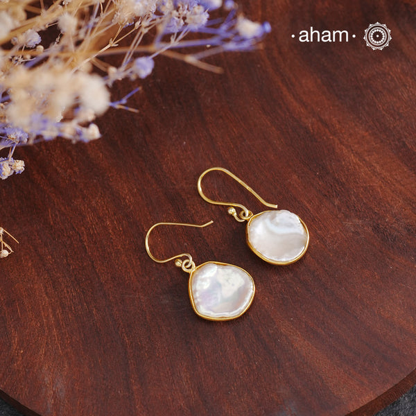 Shimmer and shine with these Mother of Pearl Gold Polish Silver Earrings! The natural mother of pearl is set in stylish silver with a touch of gold polish. The easy fishhook makes them light weight and a perfect go-to for any outfit. Dress them up or down, they'll be your new fave!
Keep in mind that these are natural forms, so both earrings in the set will have a similar shape, but not an exact match.