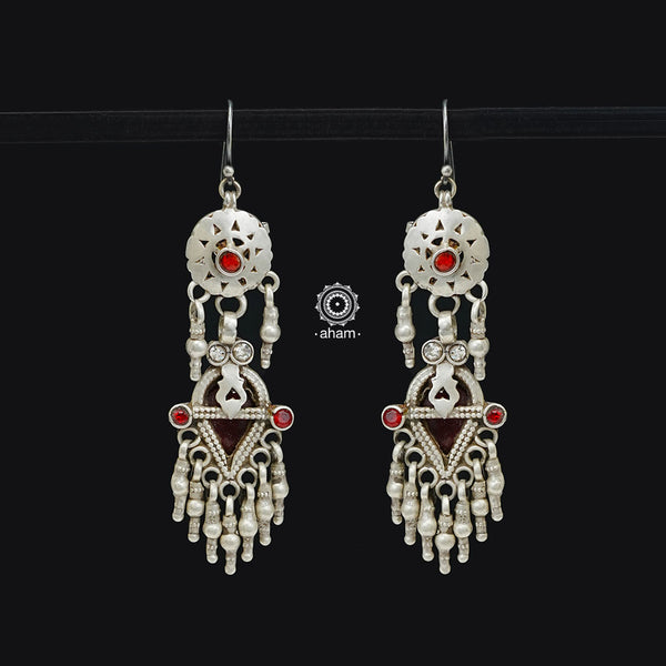 Vintage earrings with red semi precious stones crafted in&nbsp;traditional artistry and craftsmanship. An ode to the glorious state of Rajasthan.