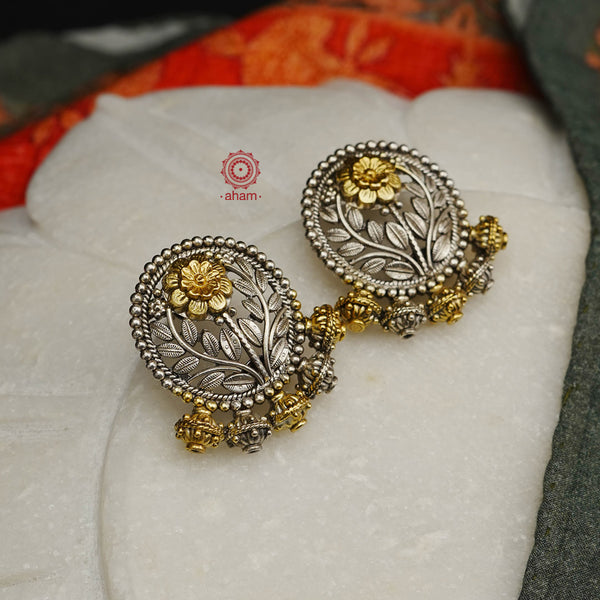 Noori two tone earrings in 92.5 sterling silver. Handcrafted earrings with  beautiful flower motifs. Style this up with your favourite ethnic or fusion outfit.