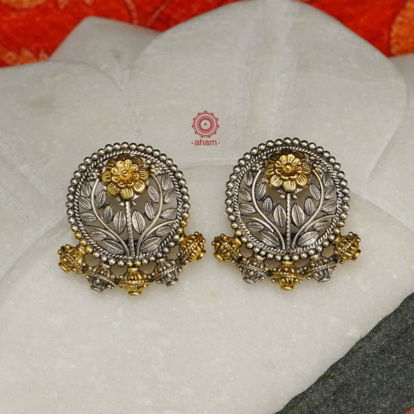 Noori two tone earrings in 92.5 sterling silver. Handcrafted earrings with  beautiful flower motifs. Style this up with your favourite ethnic or fusion outfit.