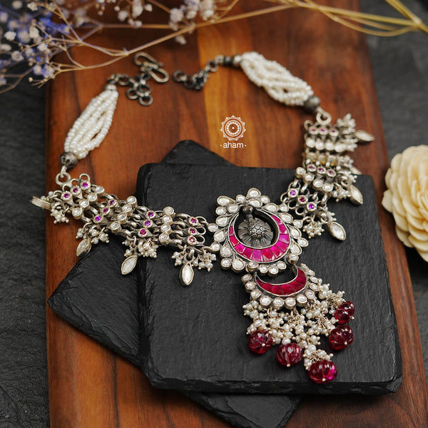 Beautiful handcrafted sterling silver choker with a peacock center, moghul Inspired semi precious gem setting, kundan and pearl work. Delicate handwork, perfect for festivities. 