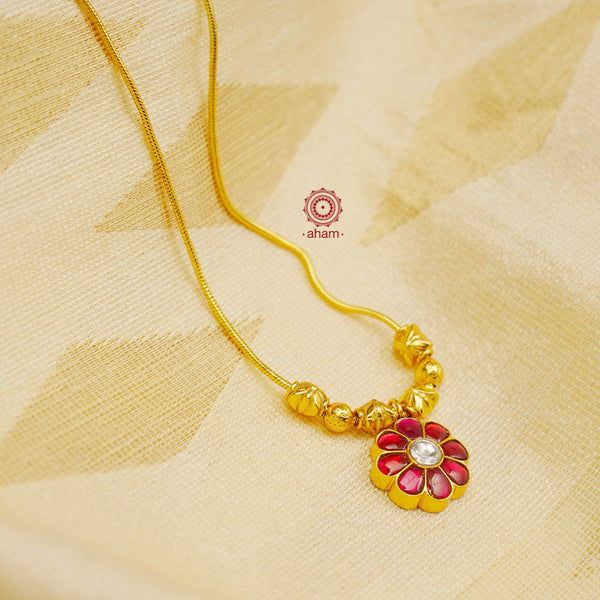 This exquisite silver necklace dipped in gold is handcrafted with gorgeous kundan work. Its lightweight design makes it perfect for family events and festivities.  