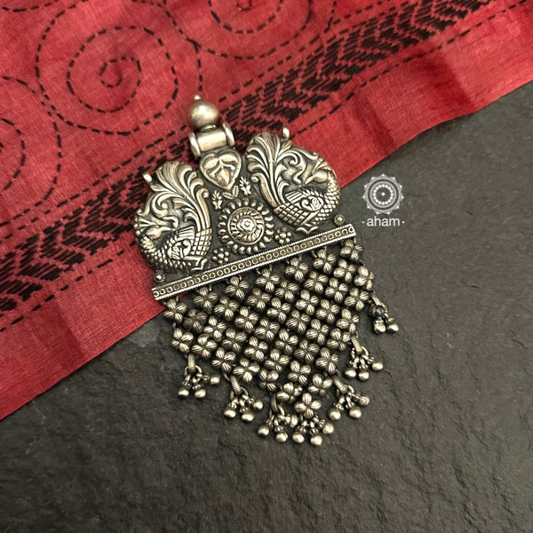 Mewad pendant crafted in 92.5 sterling silver.(Does not include chain). Wear it with a long chain on your formal Indian wear to complete your work look. 