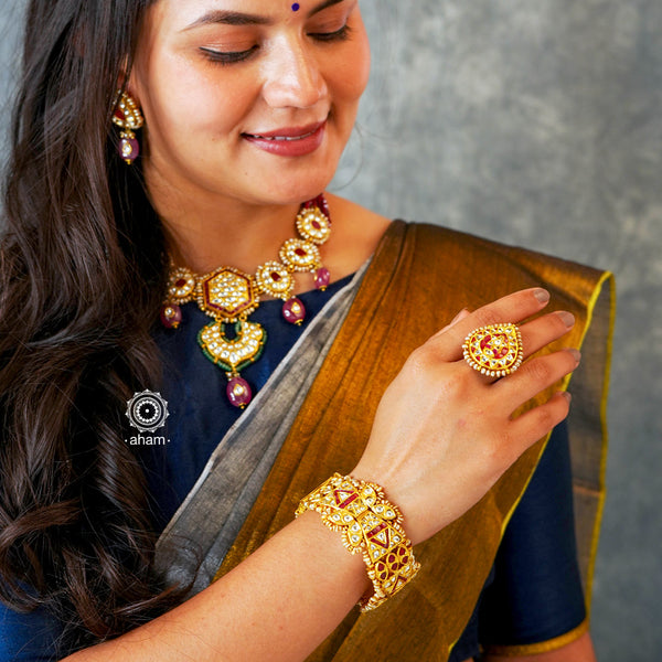 Classic and versatile gold polish kundan Kadas, handcrafted in 92.5 sterling silver.  Must have for piece for weddings and occasions.     The price is for 2 piece kada only.  Comes as a pair. 