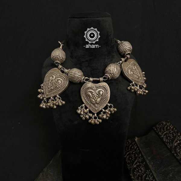 For those who enjoy and appreciate traditional tribal pieces, this one is for you. A beautiful statement neckpiece with heart shaped pendants with peacock motifs on them along side some big vintage beads and ghungroos. A stunning piece this one is. 