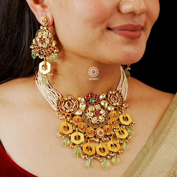 Traditional Jewellery perfect for family weddings.  Beautiful antique finish neckpiece set intricately embedded in the  lustre of precious coloured stones and pearls. A stunning addition to your wedding look. The beautiful workmanship is something that can be cherished and passed on for generations to come. 