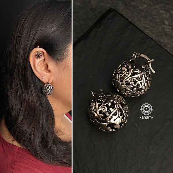 Mewad ball shaped earrings with intricate floral work. Handcrafted in 92.5 sterling silver. An ode to the glorious state of Rajasthan. Perfect lightweight, everyday wear earrings.
