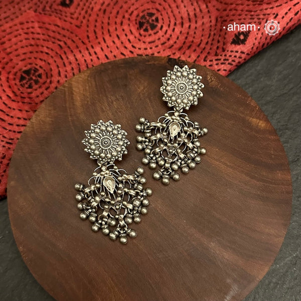 Our best-selling Filigree Silver Stud Earrings feature an intricate lace-like design, crafted by twisting fine silver strands into elegant patterns. These timeless earrings are guaranteed to be a staple in your wardrobe for years to come.