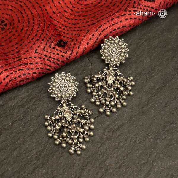 Our best-selling Filigree Silver Stud Earrings feature an intricate lace-like design, crafted by twisting fine silver strands into elegant patterns. These timeless earrings are guaranteed to be a staple in your wardrobe for years to come.