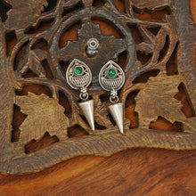 Mewad silver earrings with green stones. An ode to the glorious Rajasthan. Light weight great as everyday and ethnic wear. 