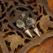 Mewad silver earrings with green stones. An ode to the glorious Rajasthan. Light weight great as everyday and ethnic wear. 