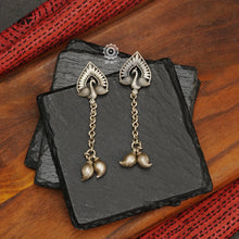 Beautiful peacock earring with ambi drops crafted in silver.  Simple designs with so much character in them, you will enjoy wearing these for a long time. 