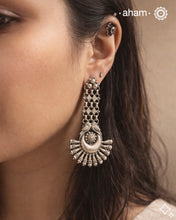 Beautiful silver long earring handcrafted in 92.5 sterling silver with two little parrots. Light weight long statement pieces. Easy to wear all day long. An ode to the glorious state of Rajasthan.