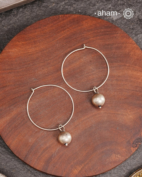 Contemporary light weight hoop earrings in 92.5 silver. Simple, lightweight and great as workwear.