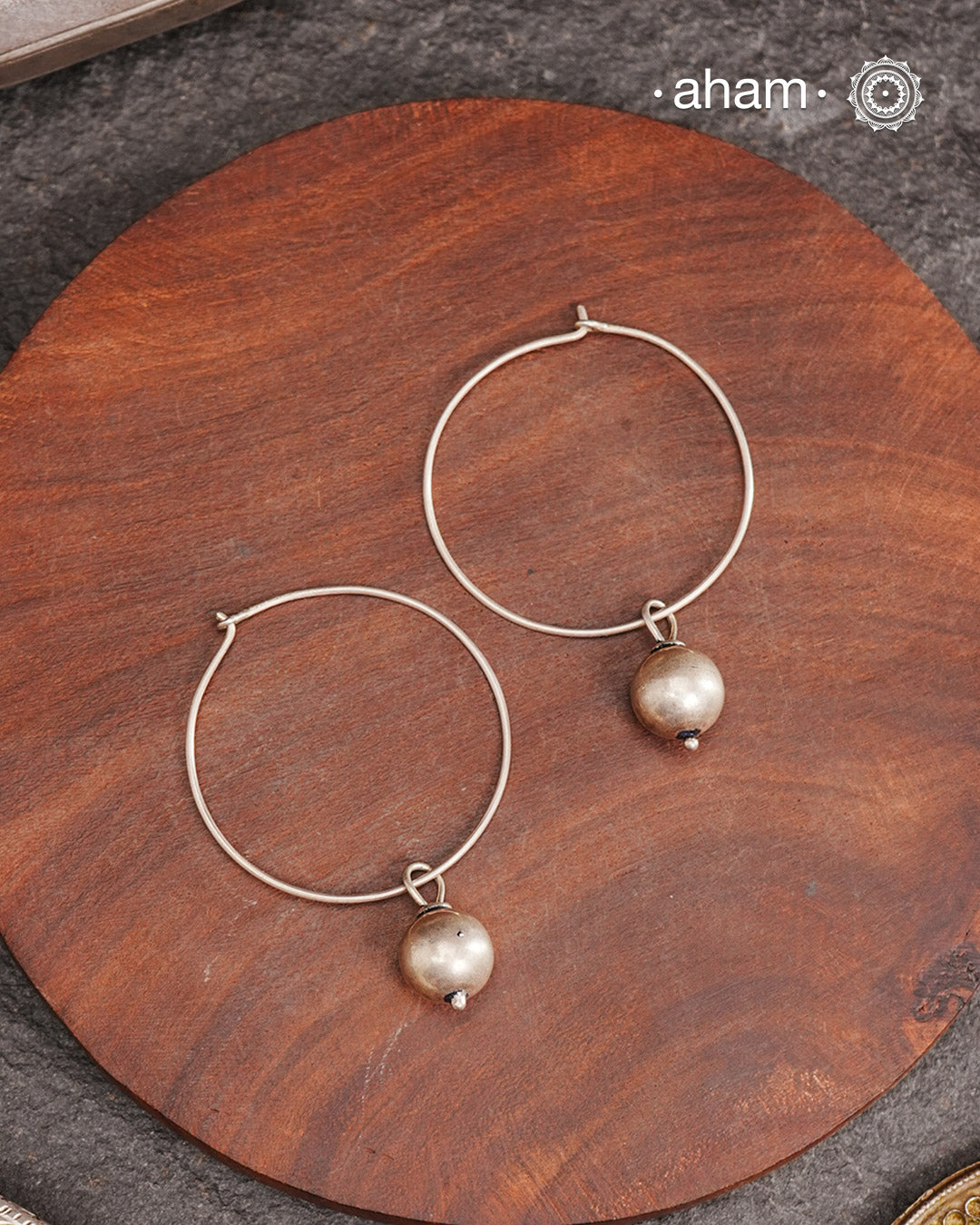 Contemporary light weight hoop earrings in 92.5 silver. Simple, lightweight and great as workwear.