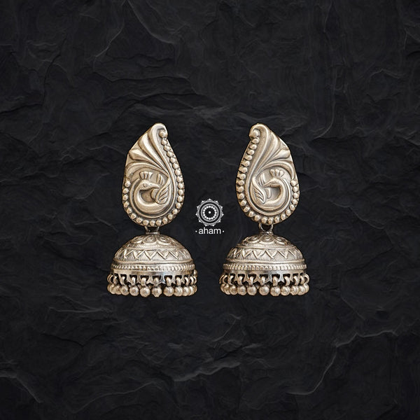 Mewad Peacock Silver jhumkie earrings handcrafted in 92.5 sterling silver. An ode to the glorious state of Rajasthan. Lightweight earrings that look great with your ethnic outfits.