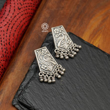 Mewad stud earrings handcrafted in 92.5 sterling silver with intricate peacock motif. An ode to the glorious state of Rajasthan. Light weight great as everyday and ethnic wear. 