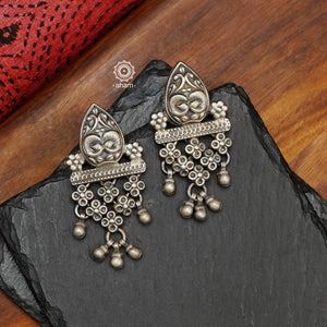 Mewad silver earrings handcrafted in 92.5 sterling silver with floral work. An ode to the glorious state of  Rajasthan. Light weight, great as everyday and ethnic wear. 