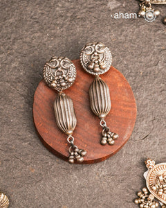 Mewad silver earrings handcrafted in 92.5 sterling silver with floral work. An ode to the glorious state of Rajasthan. Light weight, great as everyday and ethnic wear.