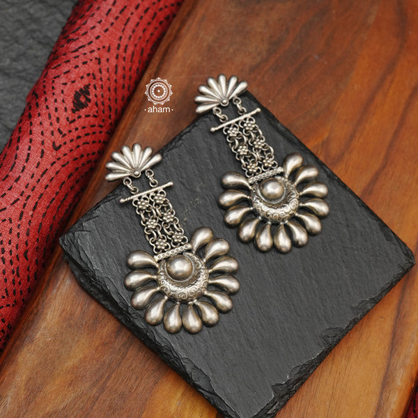 Mewad chandbali inspired earrings handcrafted in 92.5 sterling silver with floral work. An ode to the glorious state of  Rajasthan. Light weight, great as everyday and ethnic wear. 