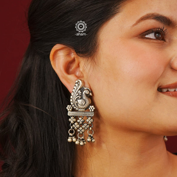 Mewad peacock silver earrings handcrafted in 92.5 sterling silver with floral work. An ode to the glorious state of  Rajasthan. Light weight, great as everyday and ethnic wear. 