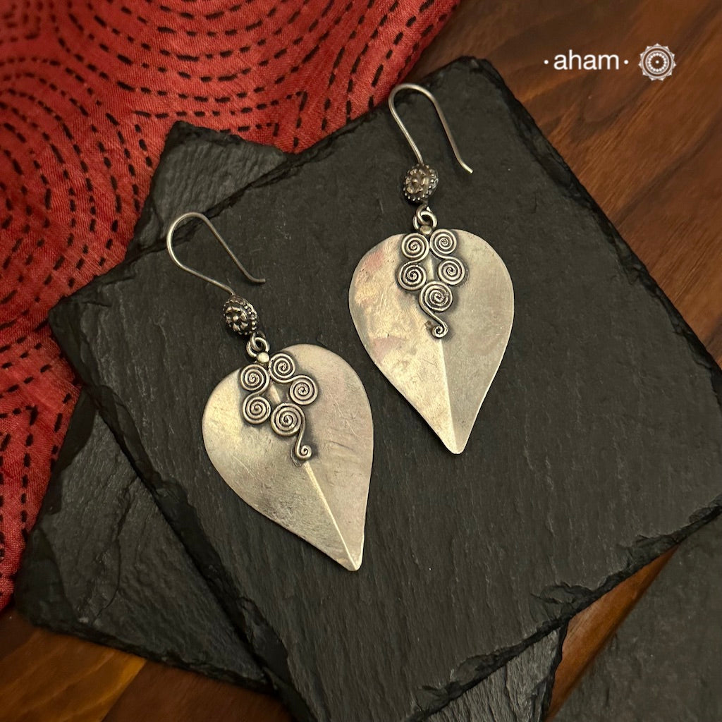 Upgrade your style with Mewad Silver Leaf Earrings. Made from high-quality 92.5 silver, these earrings offer a modern, sleek design that will elevate any outfit. The perfect accessory for any occasion.