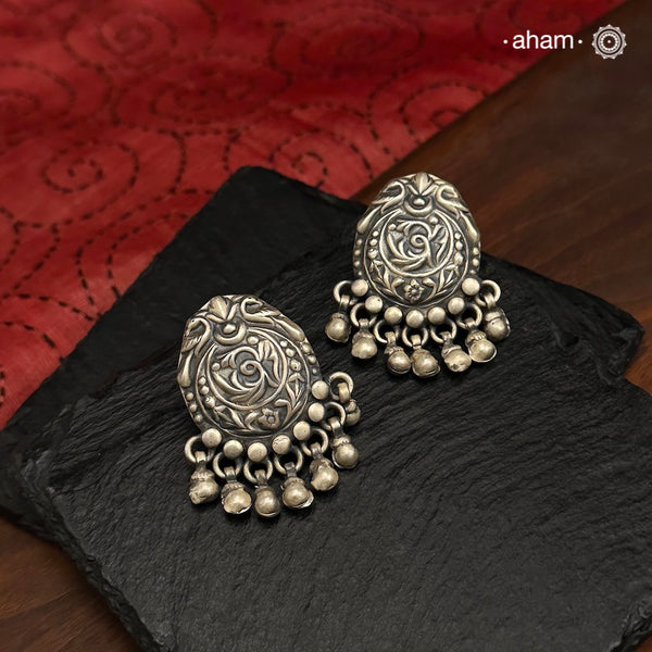 Elevate your traditional outfits with Mewad Silver Earrings. Handcrafted in 92.5 sterling silver, these studs pay homage to the rich culture of Rajasthan. Add a touch of elegance to any look with these beautiful earrings.