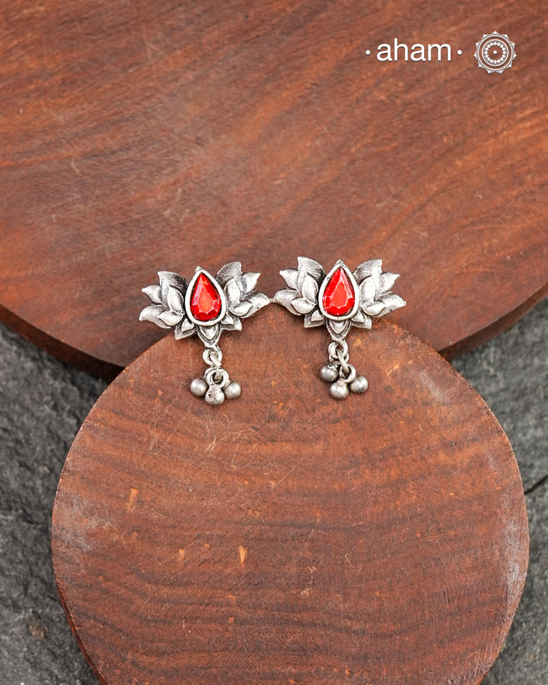 Mewad Lotus Silver Earrings with handcrafted in silver with a red center glass stone. An ode to the glorious state of Rajasthan. Great for everyday wear