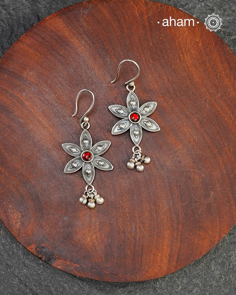 Expertly crafted with silver with a red ston center, our Mewad Flower Silver Earrings are the perfect accessory for everydaywear. Lightweight, fun and easy to wear all day long.