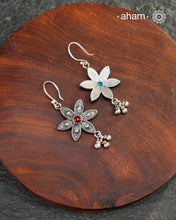 Expertly crafted with silver with a red ston center, our Mewad Flower Silver Earrings are the perfect accessory for everydaywear. Lightweight, fun and easy to wear all day long.