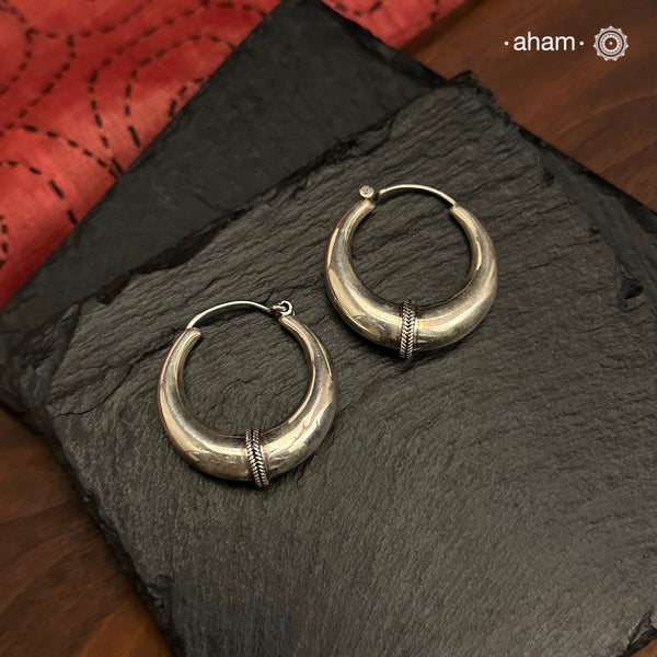 Mewad bali earrings handcrafted in 92.5 sterling silver.  Light weight classic hoops that look great with both ethnic and work wear. 