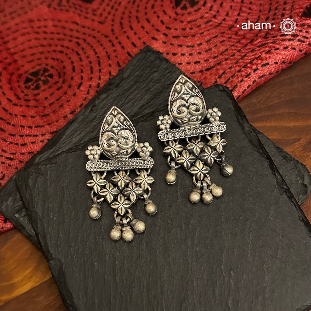 Mewad Peacock silver earrings handcrafted in 92.5 sterling silver with floral work.An ode to the glorious state of Rajasthan. Light weight, great as everyday and ethnic wear.