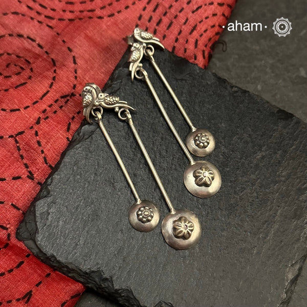 Mewad Parrot Silver Earrrings handcrafted in 92.5 sterling silver.&nbsp;An ode to the glorious state of Rajasthan. Lightweight earrings that look great with your ethnic outfits.