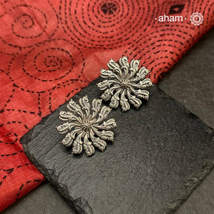 Mewad silver earrings handcrafted in 92.5 sterling silver with beautiful parrots.

An ode to the glorious state of&nbsp; Rajasthan. Light weight, great as everyday and ethnic wear.