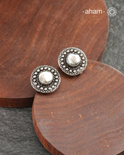 Mewad silver earrings with white stone in the center. An ode to the glorious state of Rajasthan. Light weight, great as everyday and ethnic wear.