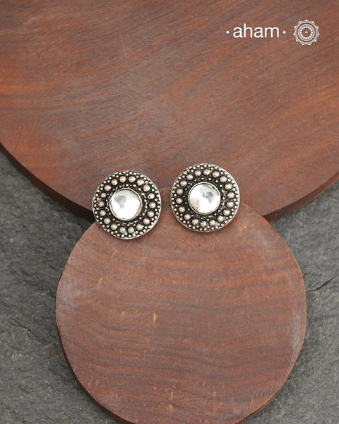 Mewad silver earrings with white stone in the center. An ode to the glorious state of Rajasthan. Light weight, great as everyday and ethnic wear.