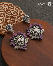 Complete your wardrobe with the elegance of these Double Sided Silver Earrings. Featuring maroon and deep blue stones, crafted in silver, they can easily be switched up to match any outfit. Perfect for any occasion.