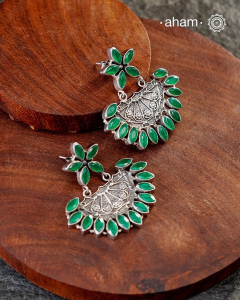 92.5 Sterling Silver Earrings with green coloured stones. The grid image depicts the other colours in this design and model image for size reference.