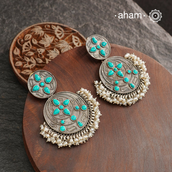 Feel beautiful in these summer love turquoise silver earrings with cultured pearls. Pair it with your light toned outfits for a pop of colour.
