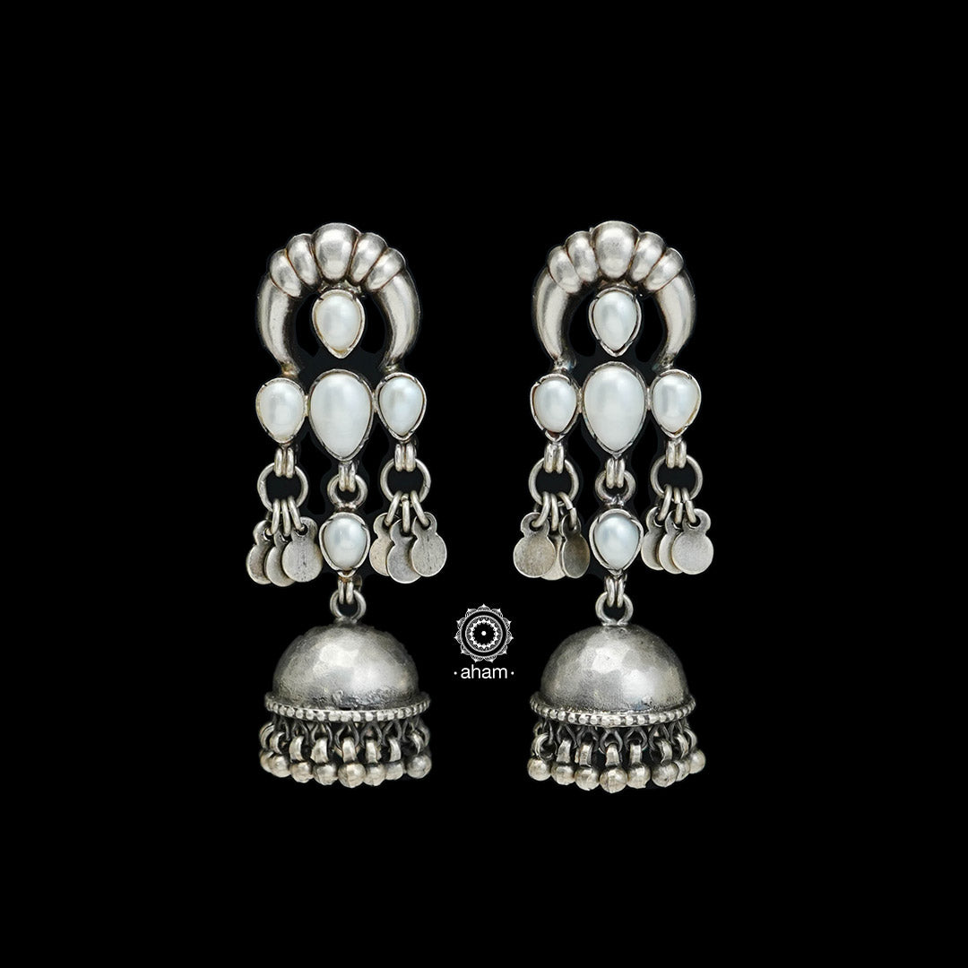 This Summer Love Pearl Silver Jhumkie is a classic statement piece crafted with 92.5% silver. Perfect for both formal and casual occasions, this timeless piece will add an elegant touch to any ensemble.