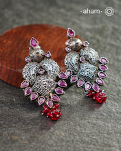 Beautiful Summer Love earrings. Handcrafted in silver with maroon coloured stone highlights.