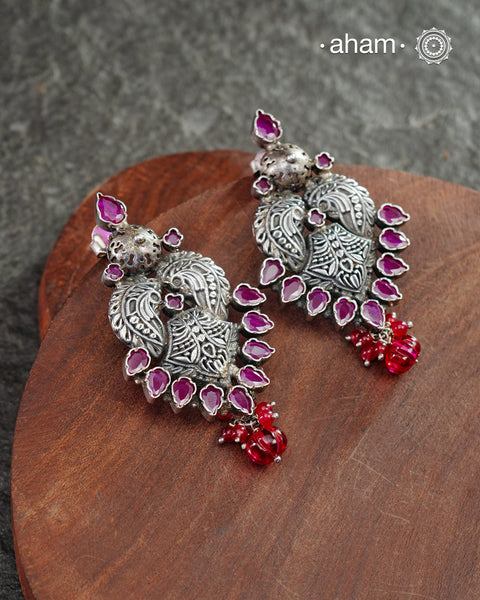 Beautiful Summer Love earrings. Handcrafted in silver with maroon coloured stone highlights.