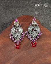 Beautiful Summer Love earrings. Handcrafted in silver with maroon coloured stone highlights.