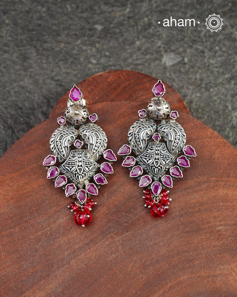 Beautiful Summer Love earrings. Handcrafted in silver with maroon coloured stone highlights.
