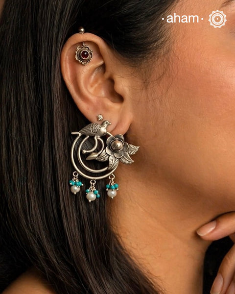 Feel beautiful in these fun summer love turquoise silver earrings with cultured pearls. Pair it with your light toned outfits for a pop of colour.