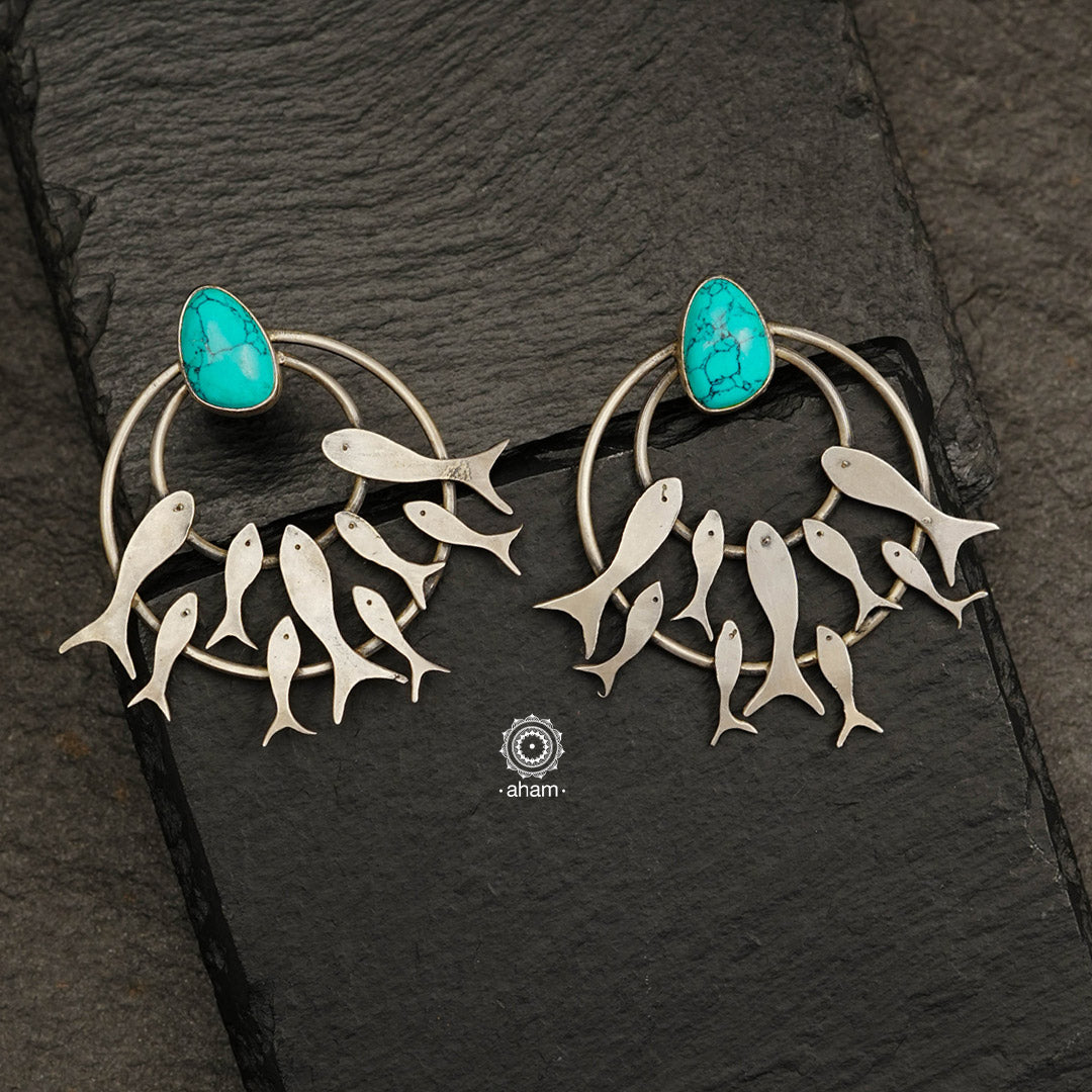 Add some fun to your wardrobe with these quirky & fun Fish Earrings. Made in 92.5 sterling silver with semi precious stone setting.