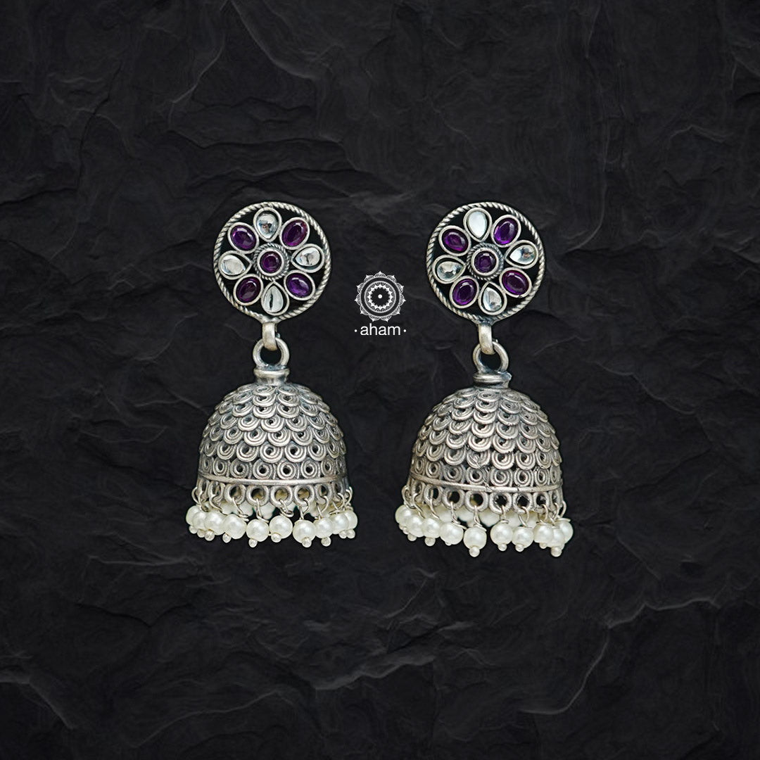 Elegant bold handcrafted jhumka earrings created in 92.5 sterling silver with maroon stones and cultured pearls. Pair it with your kurta or saree for special occasions and ceremonies this wedding season.