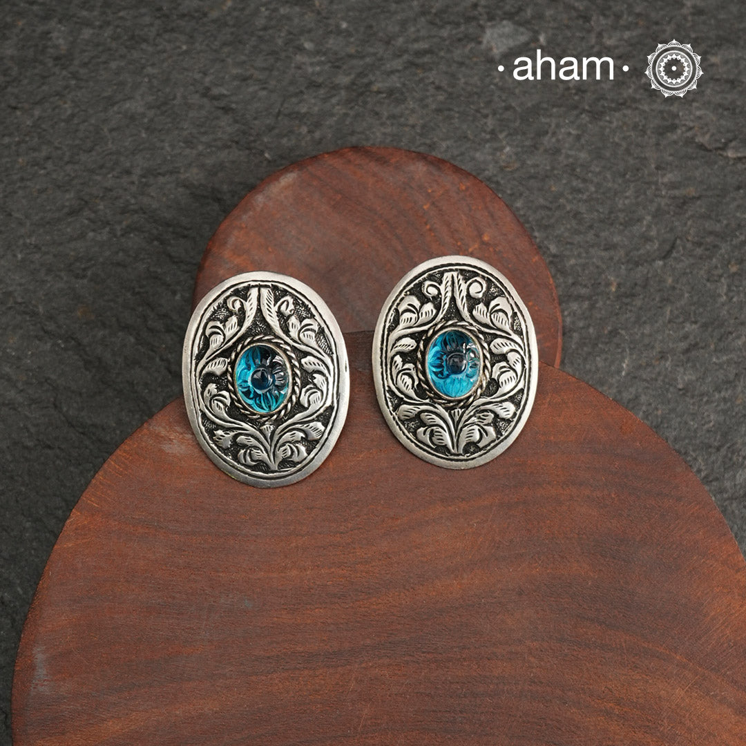 Everyday wear Summer Love silver earrings with beautiful chitai work and a vibrant blue stone in the center. Handcrafted in 92.5 sterling silver.