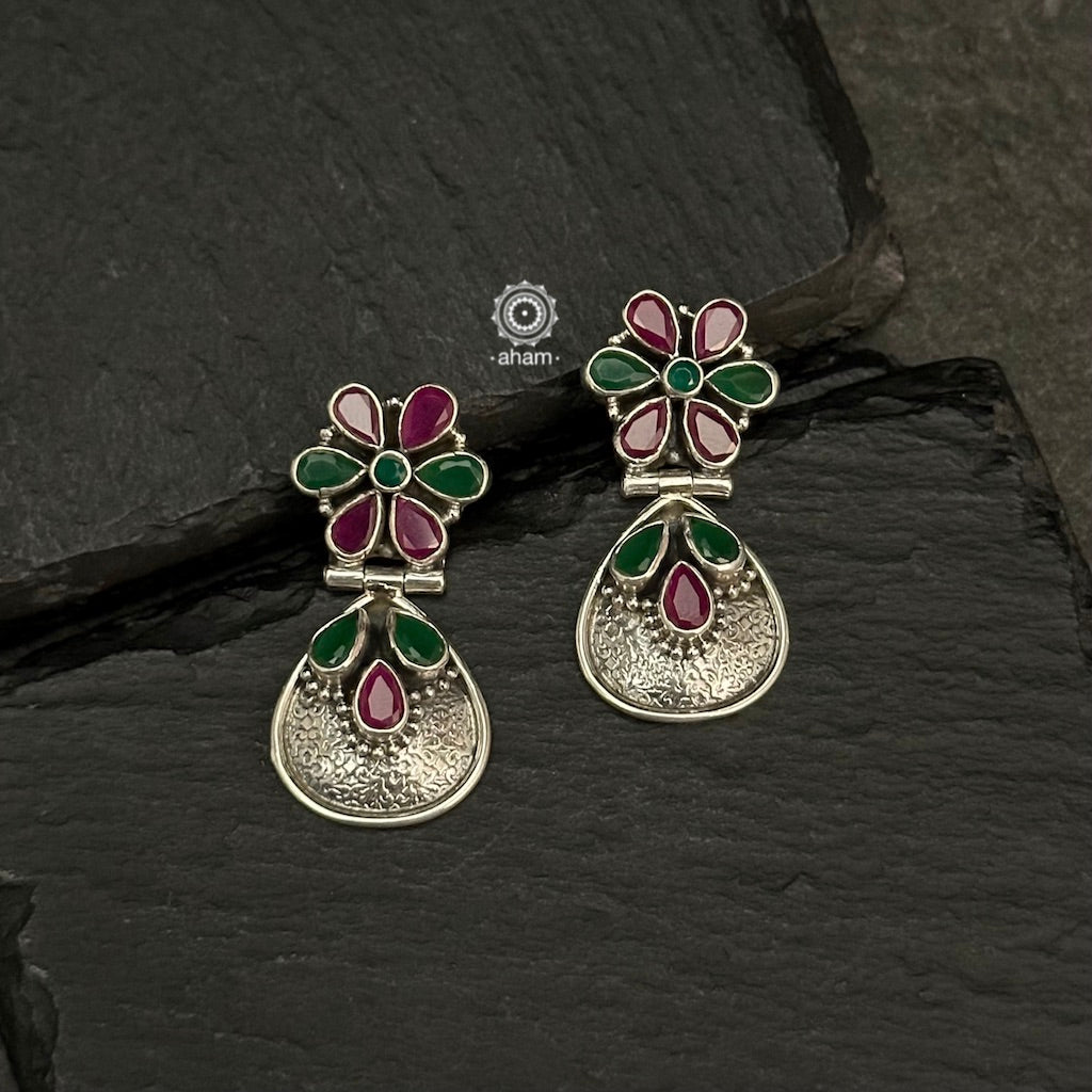 Beautiful 92.5 silver earrings with a maroon and green stone flowers.  Aham's Summer Love collection is all about being fun, light-weight and colourful.